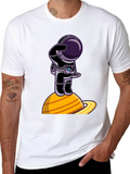 Astronaut on Saturn Graphic T-Shirt - Space Explorer product image 1